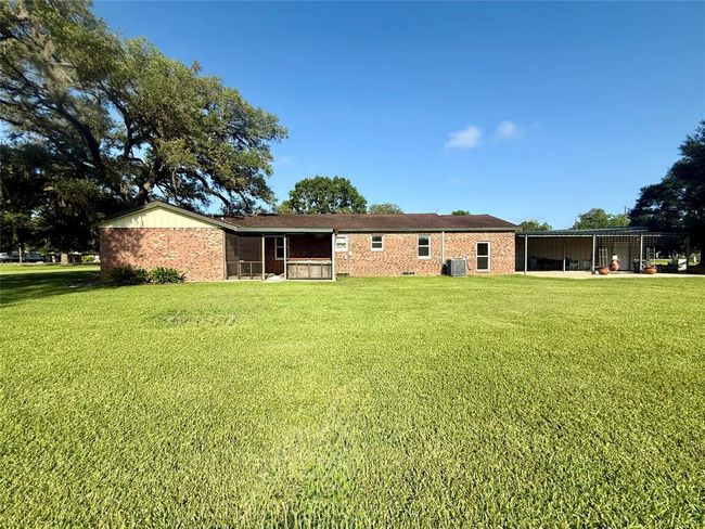 View of house from pond | Image 24