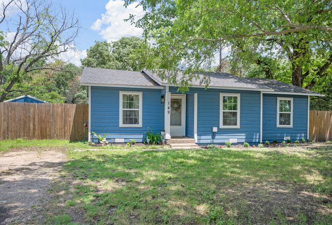 View of front of home with a shingled roof | Image 25