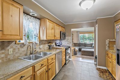 1625 W Kiernan Ave, Home with 4 bedrooms, 2 bathrooms and null parking in Spokane WA | Image 3