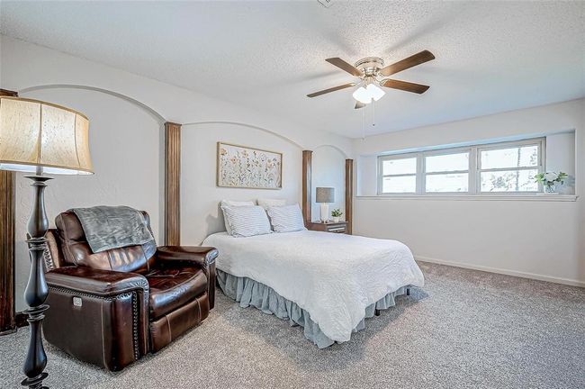 Spacious Primary suite with a row of windows and ensuite bathroom | Image 27
