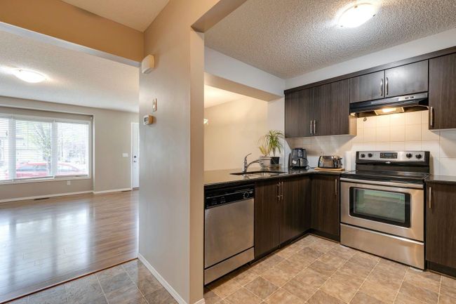 960 Windsong Dr Sw, Home with 3 bedrooms, 2 bathrooms and 4 parking in Airdrie AB | Image 12