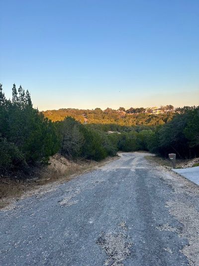 Property is on left as you drive toward cul-de-sac. Road gets rough farther down, so I recommend you park near the adjacent house and walk to property. | Image 1