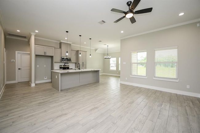 The Main Areas Of The Home is Equipped With A Lot Of Windows To Provide Natural Sunlight Inside The Home | Image 8