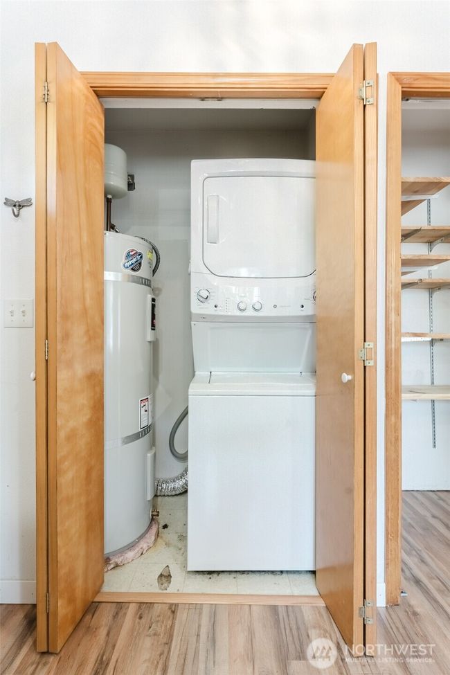 Laundry & hot water tank. | Image 11