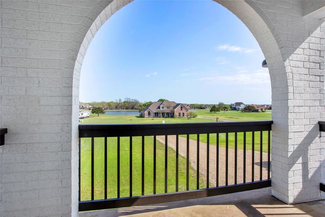 view of lake from upstairs balcony | Image 26