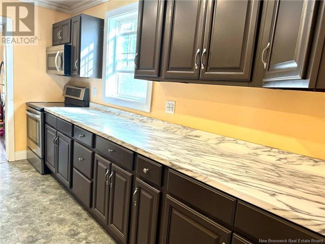 976 Pleasant Dr, House other with 6 bedrooms, 3 bathrooms and null parking in Minto NB | Image 6