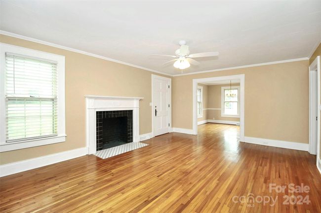 Living room w/ fireplace | Image 7
