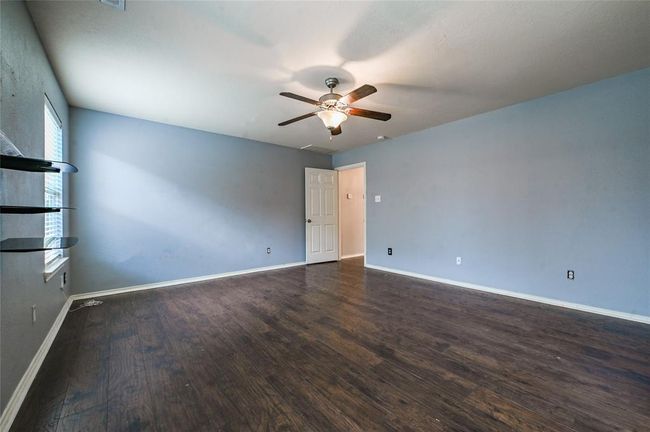 Primary bedroom located on the first floor. | Image 16