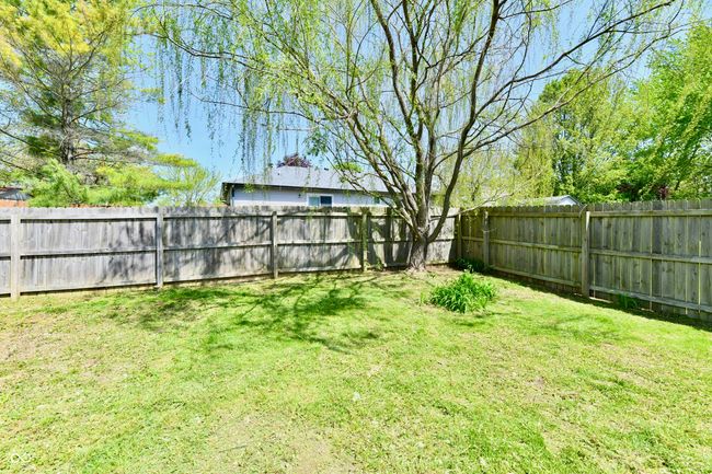 view of yard with a fenced backyard | Image 11