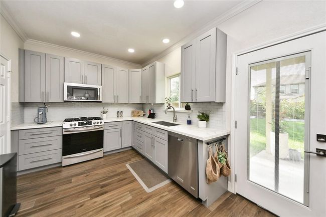Stainless Steel appliances and KitchenAid Dishwasher. | Image 12