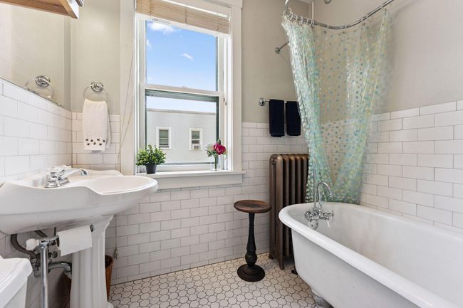 A clawfoot tub adds timeless charm and luxurious comfort to any bathroom. | Image 18