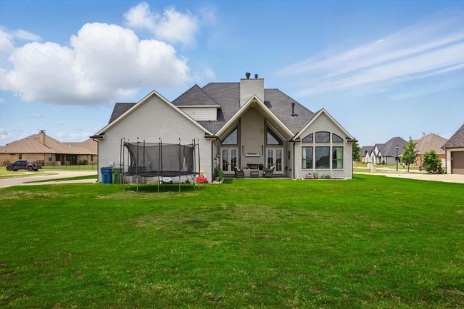 Situated on a large corner lot | Image 38