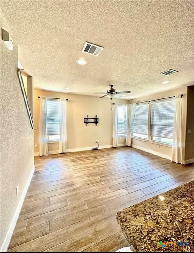 view from kitchen in living area | Image 7