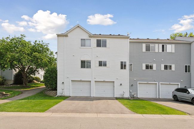 One-car attached tuck-under garage with storage | Image 19