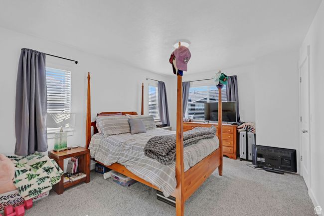 Bedroom featuring carpet | Image 12