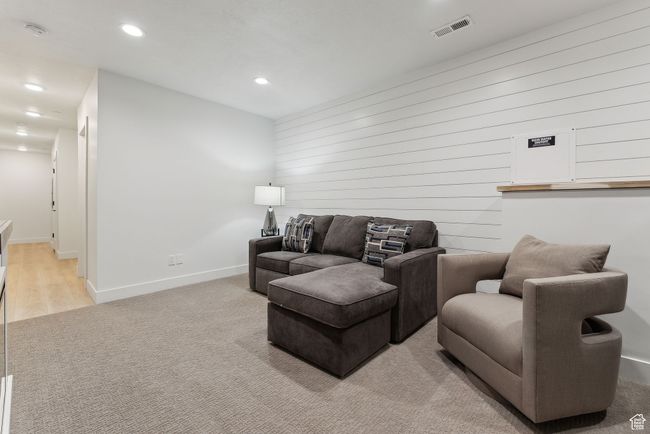 View of carpeted living room | Image 39