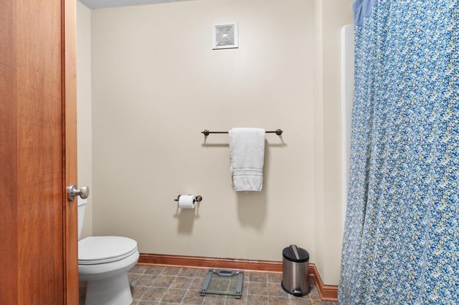 Upper-level full bath WC and tub / shower. | Image 35