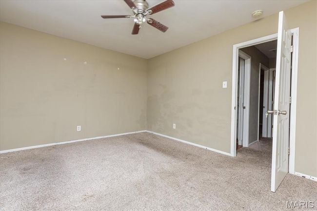Unfurnished room with carpet flooring and ceiling fan | Image 12