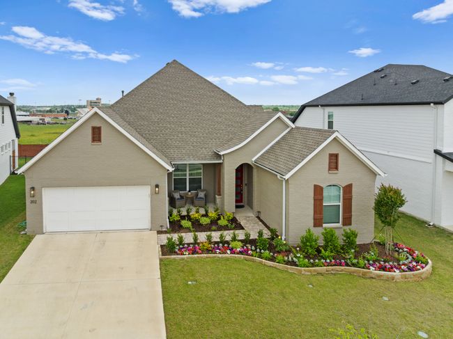 Coffee on your front porch overlooking the lovely lawn | Image 4