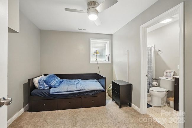 bedroom in basement | Image 29