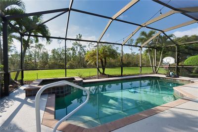 21203 Terni Court, House other with 5 bedrooms, 3 bathrooms and null parking in Estero FL | Image 2