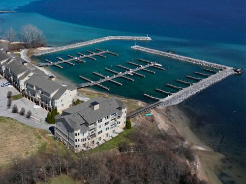 704 N Dockside Cir, Suttons Bay, MI, 49682-8423 | Card Image