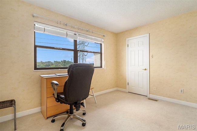 Office with carpet flooring and a textured ceiling | Image 16