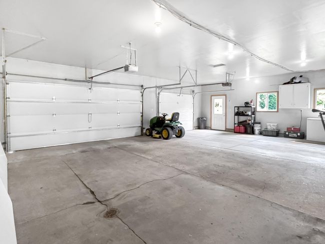 Attached 3 stall garage | Image 33