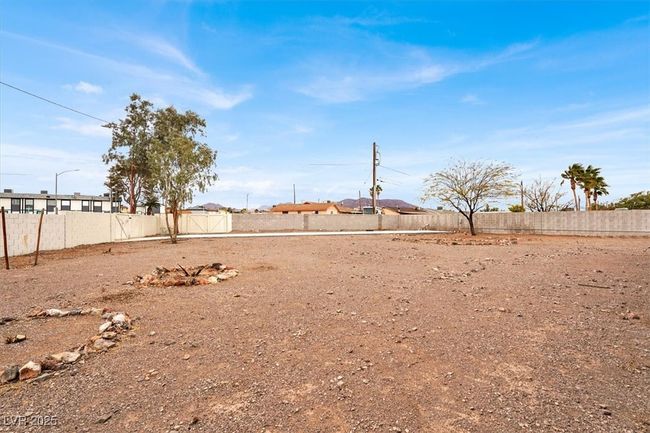 View of yard with a fenced backyard | Image 33