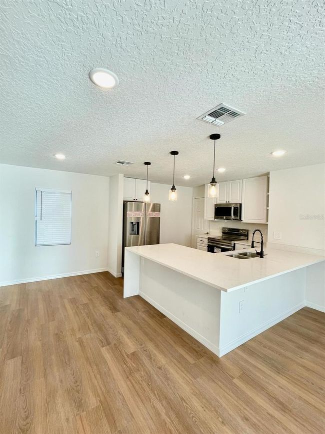 404 St Johns Ln, House other with 4 bedrooms, 2 bathrooms and null parking in POINCIANA FL | Image 4