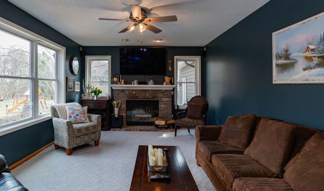 Family room with views of pool and Colby Lake.jpg | Image 7