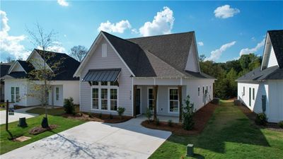 Designer Home on Lot 044! The Eli by Holland Homes LLC. All plans, pricing and specifications are subject to change without notice. | Image 3