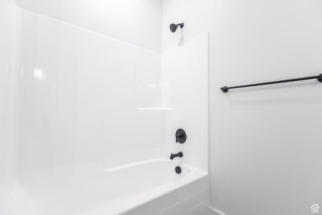 Full bathroom featuring shower / bathtub combination | Image 19