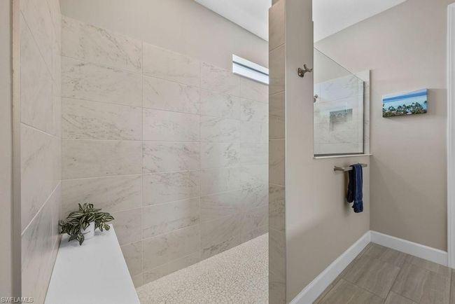 Full bath with baseboards and walk in shower | Image 23
