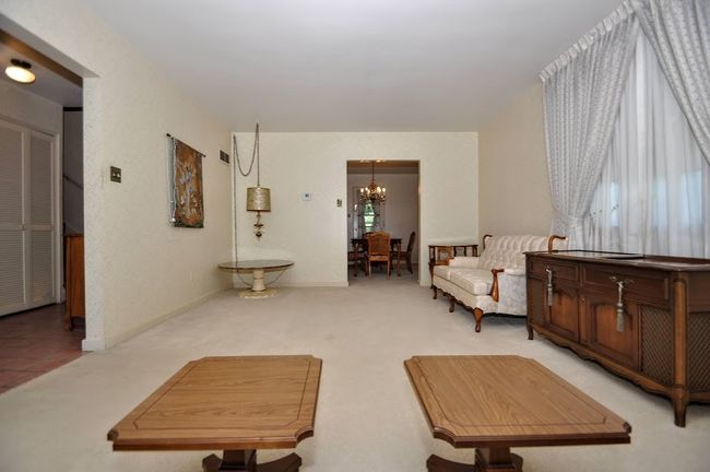 The formal diningroom has an antique crystal chandelier for formal dining. | Image 12