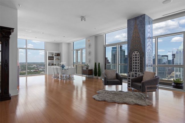 The openness of the living and dining area make this home special | Image 8