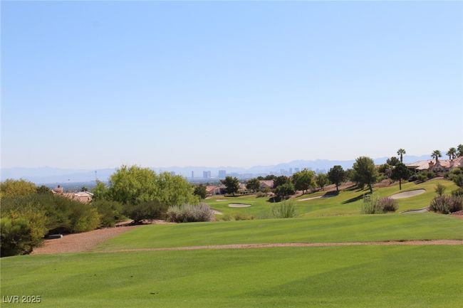 View of community featuring a lawn, a mountain view, and view of golf course | Image 34