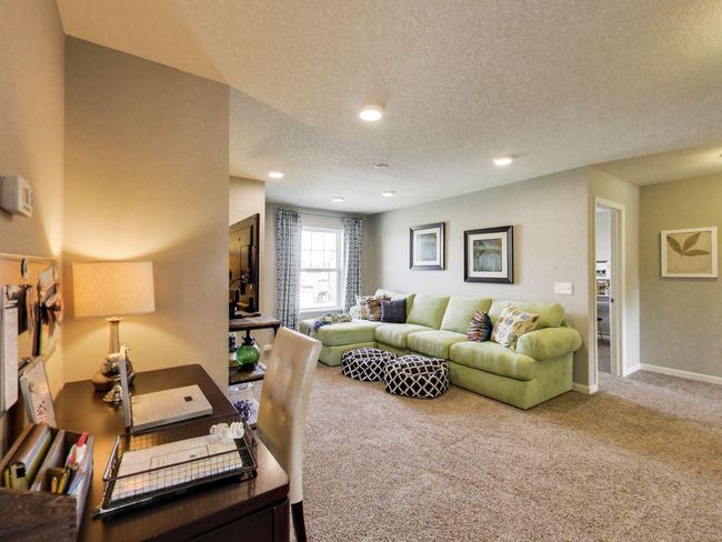 Photos are of a former model home. Actual home is under construction. | Image 12