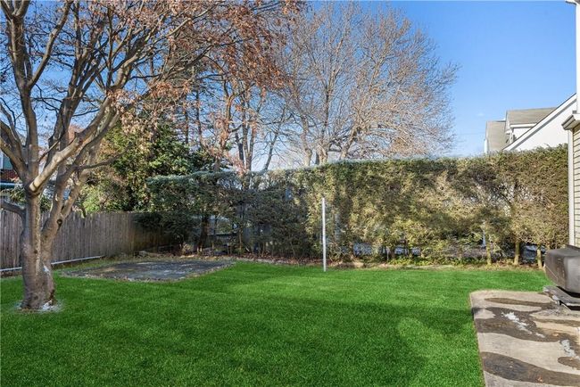 Level backyard great for entertaining and playing | Image 26