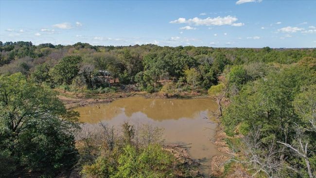 Aerial view featuring a water view | Image 13