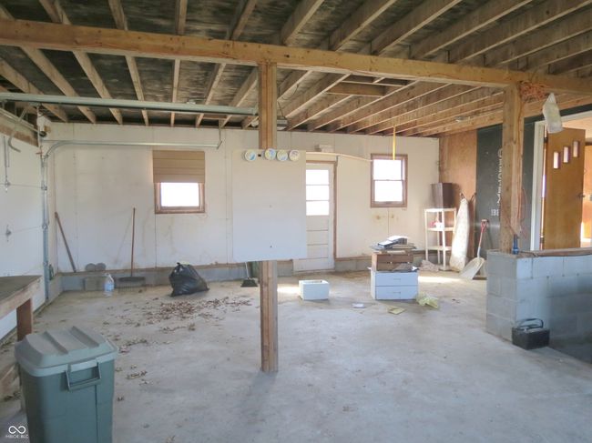 misc room with a garage | Image 14