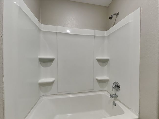 Full bathroom featuring shower / bathtub combination | Image 11