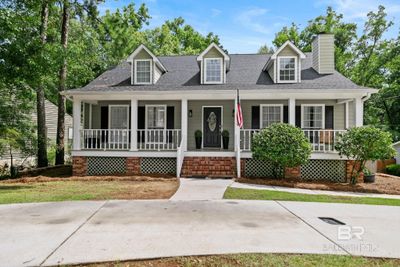 Cape cod-style house with covered porch | Image 1