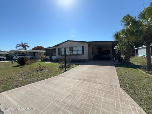 915 Hemlock St, Barefoot Bay, FL, 32976-7322 | Card Image