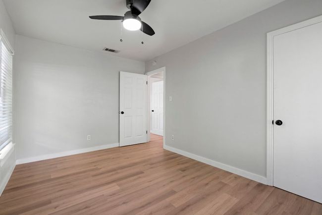 A look at the ceiling fan, the walk-in closet, and the entryway. | Image 18