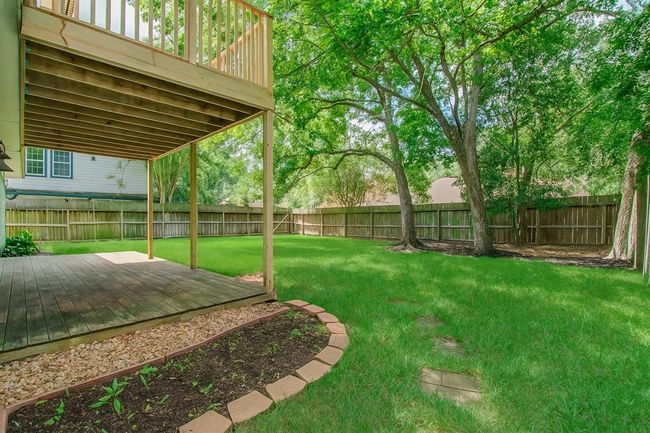 Covered patio on first floor. | Image 29