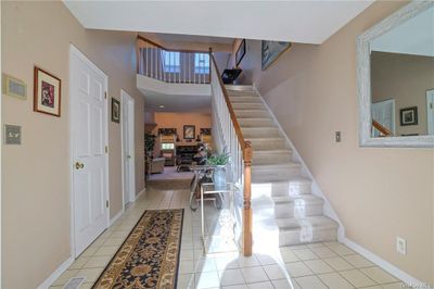 Stairway featuring tile patterned flooring | Image 3