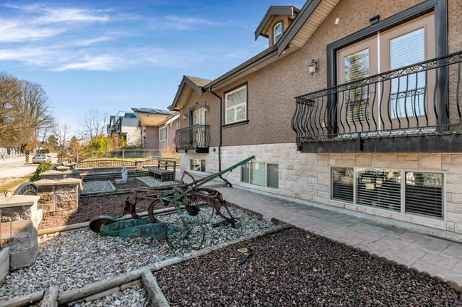 View of yard with a balcony | Image 33