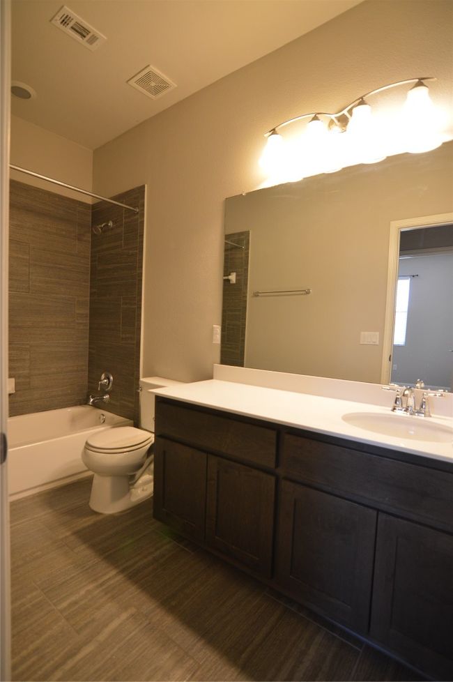 2nd Full bath featuring toilet, vanity, and shower / bathtub combination | Image 17