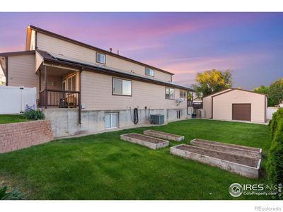 Large double lot with raised garden beds, shed and a chicken coop. | Image 2